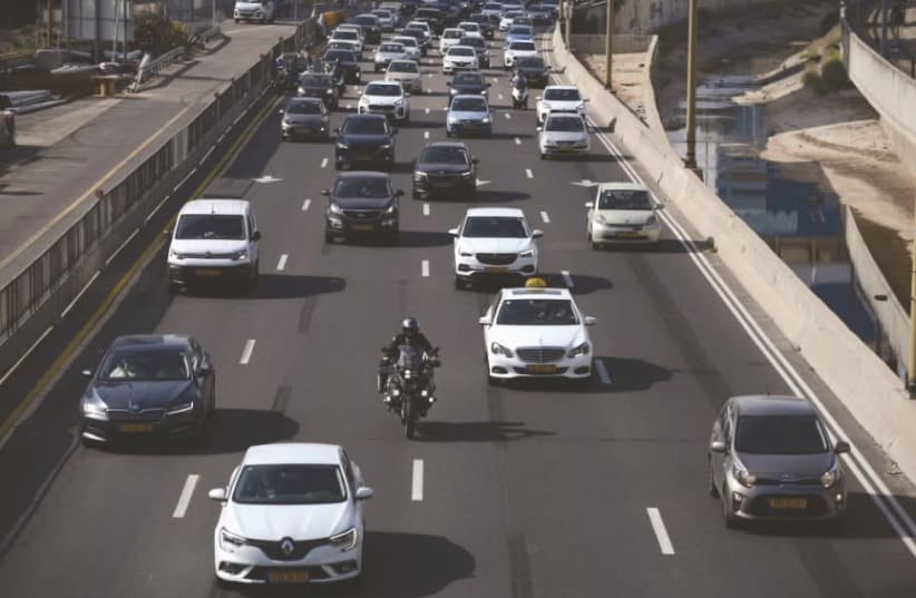 THE INCOMING government needs to present a roadmap for the first 100 days, including a two-year budget, judicial reform and a public transit overhaul. Traffic jams clog Tel Aviv’s Ayalon Highway in April (Illustrative). (photo credit: TOMER NEUBERG/FLASH90)