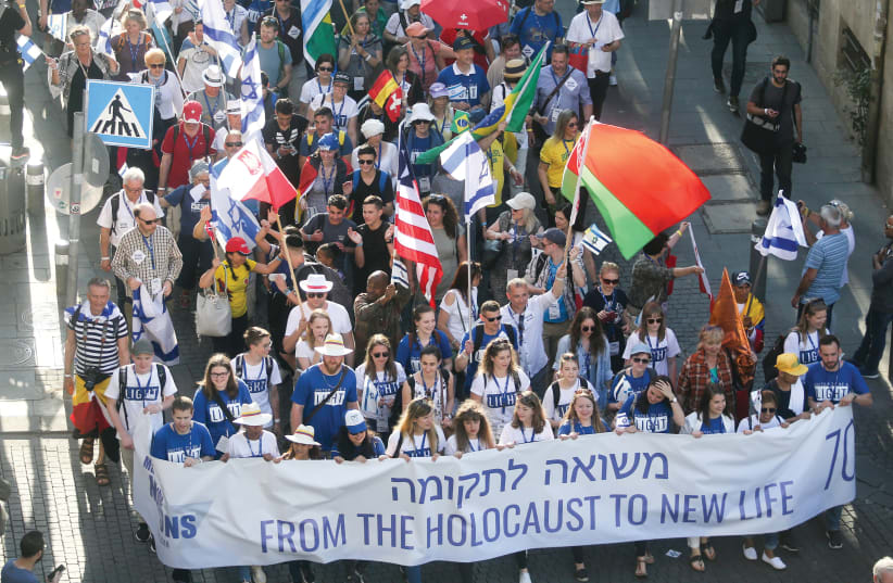 CHRISTIAN SUPPORTERS of Israel march in Jerusalem in a 2018 file photo. (photo credit: MARC ISRAEL SELLEM/THE JERUSALEM POST)