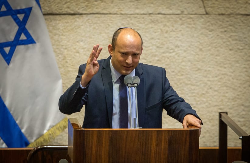 Yamina leader Naftali Bennett speaks during a Knesset plenary session at the Knesset, the Israeli parliament in Jerusalem on August 24, 2020. (photo credit: OREN BEN HAKOON/FLASH90)