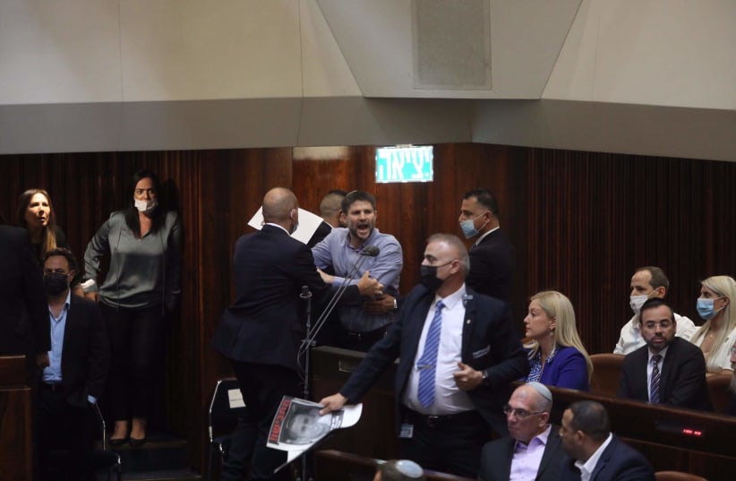 RELIGIOUS ZIONIST Party head Bezalel Smotrich kicked out of Knesset meeting as incoming Prime Minister Naftali Bennett rose to the podium to speak. (photo credit: MARC ISRAEL SELLEM)