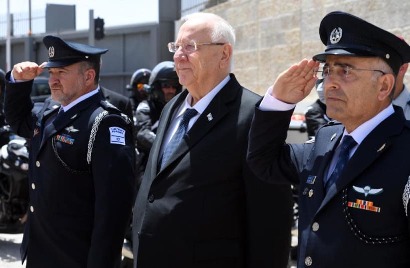 President Reuven Rivlin is seen at a farewell gathering with Israel Police in the national headquarters in Jerusalem. (photo credit: PRESIDENT'S RESIDENCE AND ISRAEL POLICE)