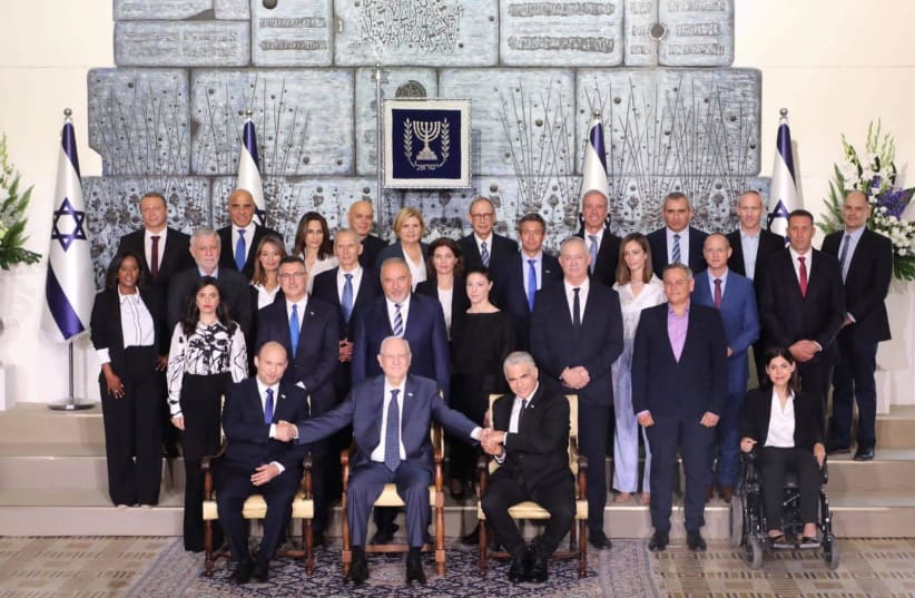 Traditional picture of the new government at the President's Residence in Jerusalem, June 14, 2021.  (photo credit: MARC ISRAEL SELLEM)