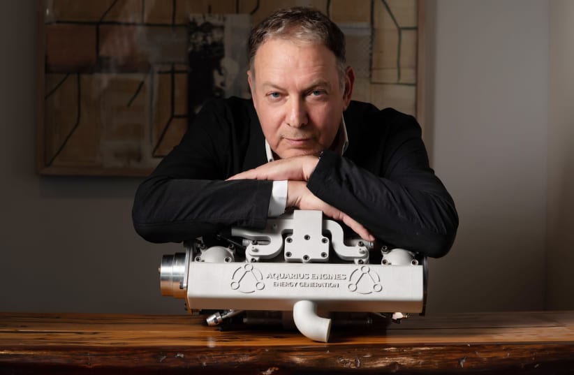 Gal Friedman, Chairman of Aquarius Engines, with the company's product (photo credit: RAMI ZERINGER)