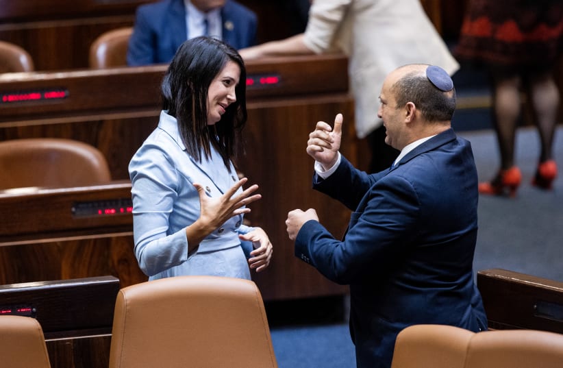 Shirley Pinto, the first deaf Knesset member with Israeli Prime Minister Naftali Bennett during a swearing in ceremony of new Israeli parliament members at the Knesset, the Israeli parliament in Jerusalem, June 16, 2021. (photo credit: YONATAN SINDEL/FLASH 90)
