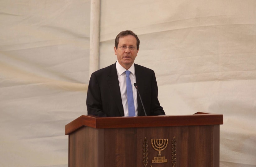 Incoming President Isaac Herzog speaks at the memorial for Yoni Netanyahu  (photo credit: MARC ISRAEL SELLEM)