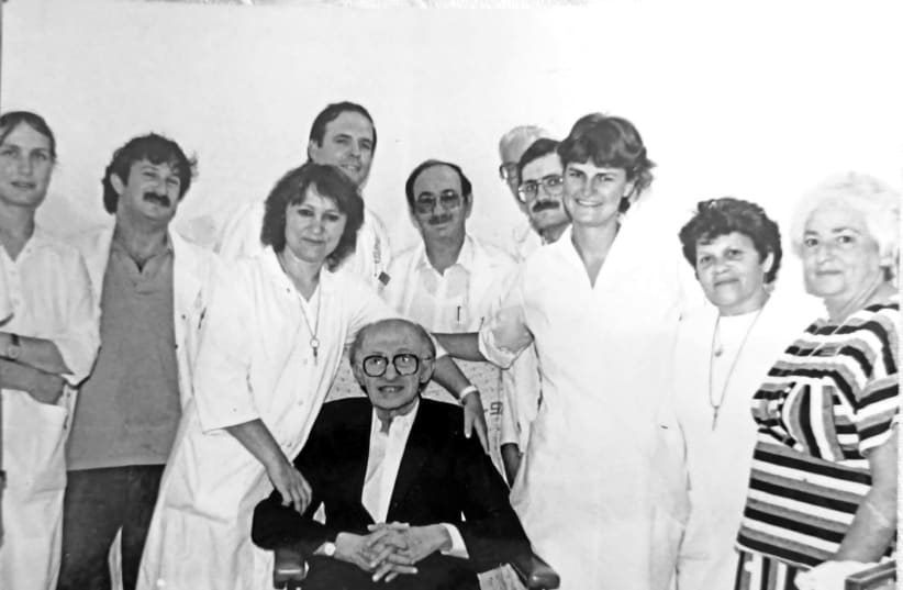 MENACHEM BEGIN just before his discharge from Shaare Zedek Medical Center, Jerusalem; he had been a pneumonia patient for two weeks. He is surrounded by his doctors and nurse, with the writer extreme right. Directly behind him are director-general Prof. Jonathan Halevy and his physician, Dr. Efraim  (photo credit: DVORA WAYSMAN)