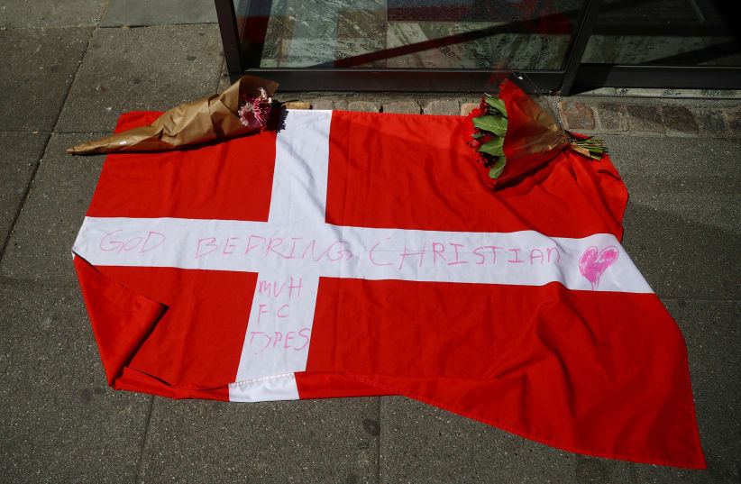 THE DANISH flag. (photo credit: HANNAH MCKAY/ REUTERS)
