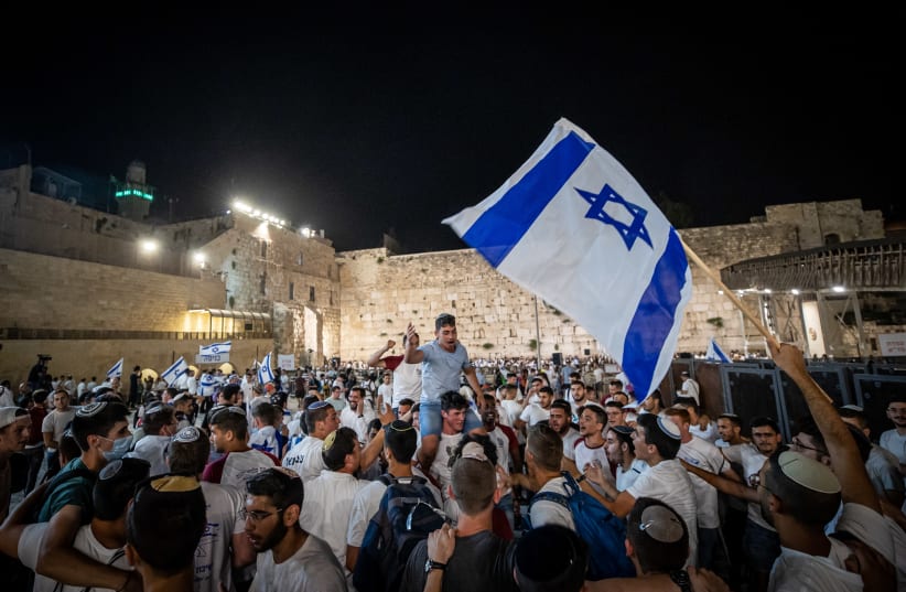 WAVING THE flag on Jerusalem Day eve, May 9. (photo credit: YONATAN SINDEL/FLASH 90)