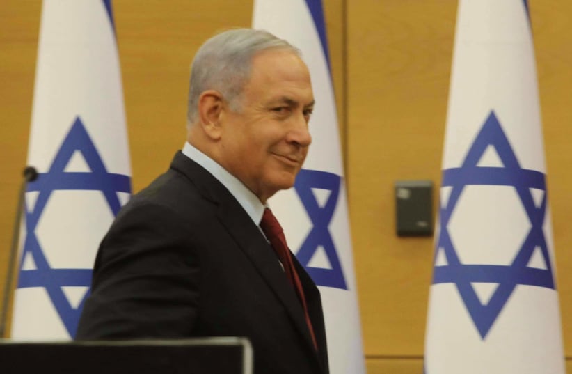Opposition leader Benjamin Netanyahu is seen at the Knesset, on June 21, 2021. (photo credit: MARC ISRAEL SELLEM/THE JERUSALEM POST)