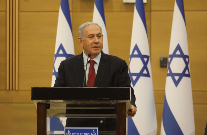 Opposition leader Benjamin Netanyahu is seen speaking at the Knesset, on June 21, 2021. (photo credit: MARC ISRAEL SELLEM/THE JERUSALEM POST)