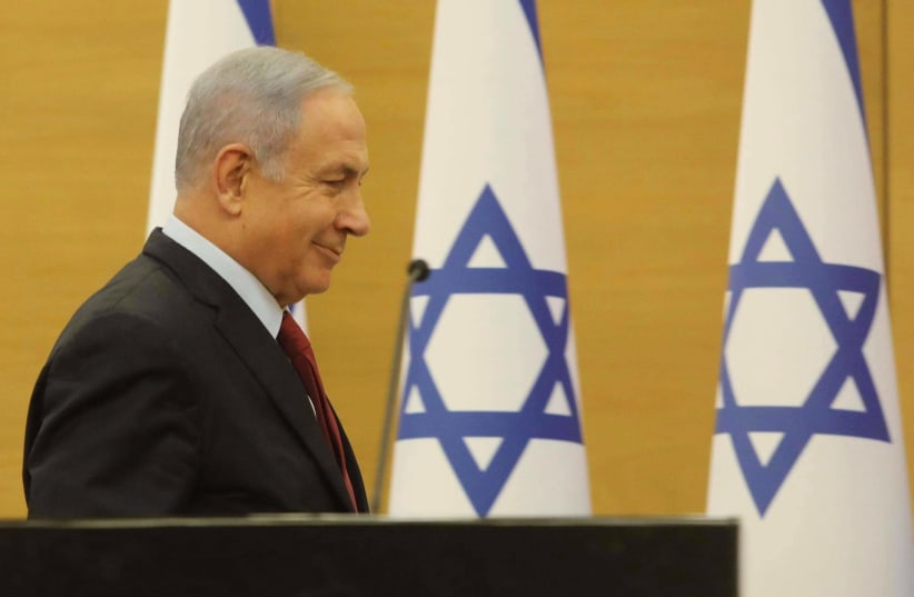 Opposition leader Benjamin Netanyahu is seen at the Knesset, on June 21, 2021. (photo credit: MARC ISRAEL SELLEM/THE JERUSALEM POST)