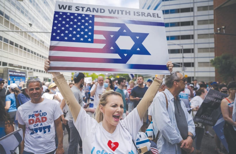 PRO-ISRAEL DEMONSTRATORS attend a rally denouncing antisemitism and antisemitic attacks, in Manhattan, last month.  (photo credit: ED JONES/AFP/GETTY IMAGES/TNS)