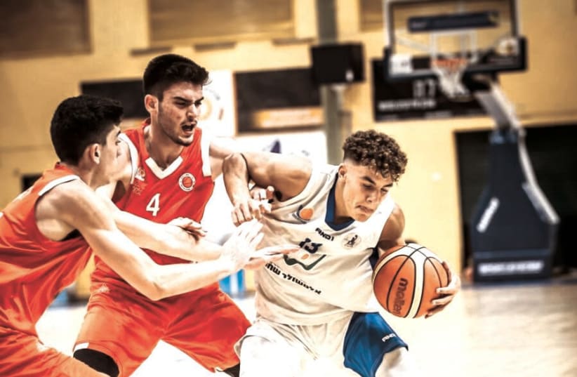 NOAM YAAKOV (right) made aliyah from Denmark at 14 and has turned into one of Israel’s brightest up-and-coming hoops stars (photo credit: ODED CARNI)
