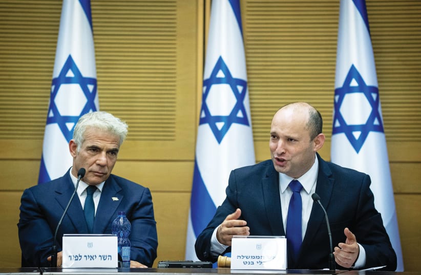 PRIME MINISTER Naftali Bennett and Foreign Minister Yair Lapid – determined to show that there is more than one way to make Israel’s voice heard. (photo credit: YONATAN SINDEL/FLASH90)