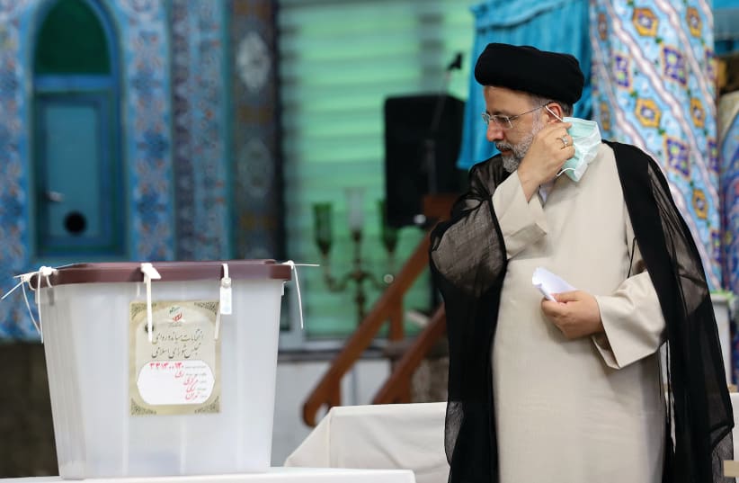 EBRAHIM RAISI arrives at a polling station in Tehran to cast his vote in last week’s presidential election, which he won. (photo credit: MAJID ASGARIPOUR/WANA (WEST ASIA NEWS AGENCY) VIA REUTERS)