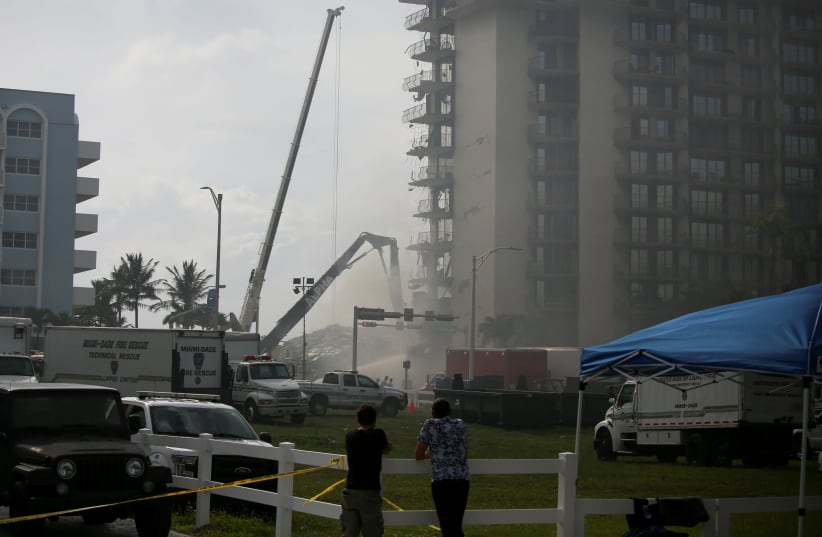 A view shows the partially collapsed residential building in Surfside, near Miami Beach, Florida, U.S. June 26, 2021. (photo credit: MARCO BELLO/REUTERS)