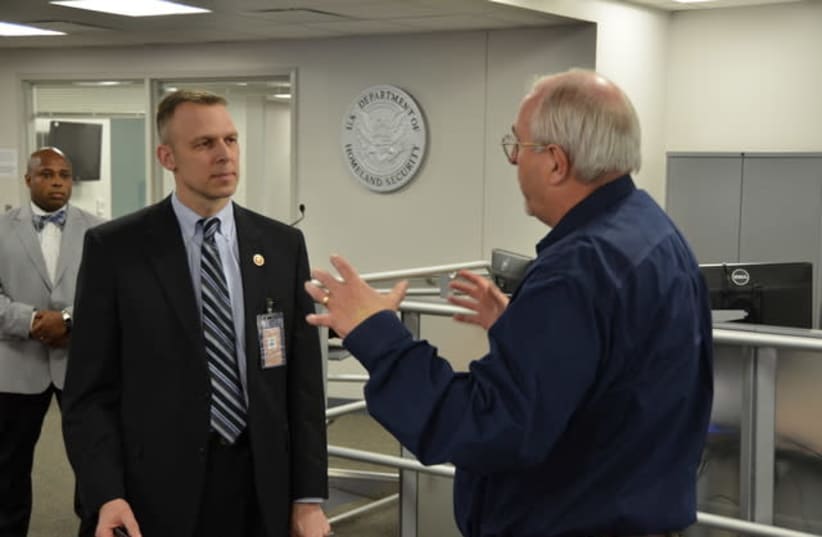 US Representative Scott Perry (R-PA) receives a tour of FEMA's National Response Coordination Center from FEMA Administrator Craig Fugate (photo credit: PAUL LUKE)