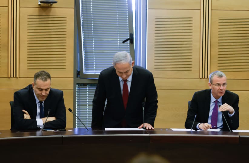 Former Israeli Prime minister Benjamin Netanyahu and head of the Likud party leads a faction meeting in the Israeli parliament on June 21, 2021.  (photo credit: OLIVIER FITOUSSI/FLASH90)