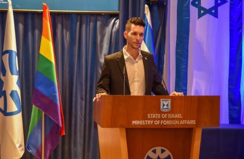 Deputy Foreign Minister Idan Roll speaks at an event marking pride month at the ministry in Jerusalem on Wednesday. (photo credit: FOREIGN MINISTRY)