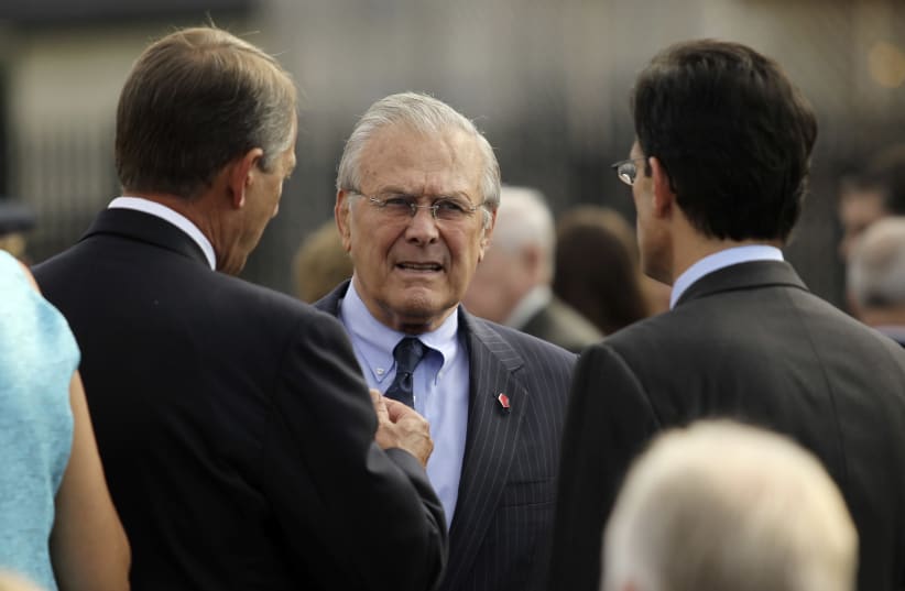 Former US Secretary of Defense Donald Rumsfeld (C) talks to Speaker of the House John Boehner (L) and House Majority Leader Eric Cantor (R) as they gather for ceremonies marking the 10th anniversary of the 9/11 attack on the Pentagon, in Washington September 11, 2011. (photo credit: MOLLY RILEY/REUTERS)