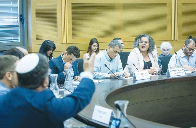 MKS ATTEND a meeting titled ‘Between occupation and apartheid’ in the Knesset in Jerusalem last month. (photo credit: YONATAN SINDEL/FLASH90)