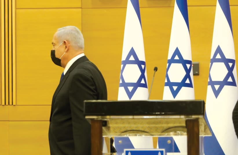 LIKUD LEADER and former prime minister Benjamin Netanyahu attends a Knesset meeting this week.  (photo credit: MARC ISRAEL SELLEM/THE JERUSALEM POST)