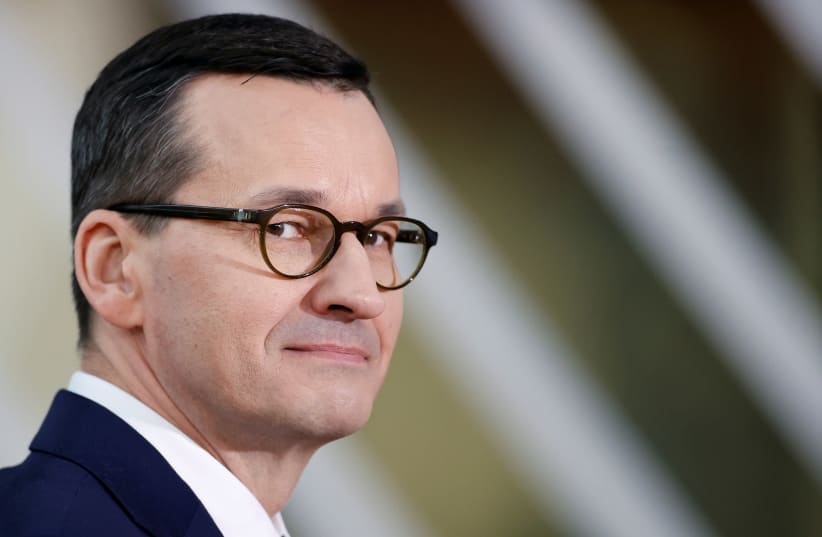 MATEUSZ MORAWIECKI: ‘As long as I am prime minister, Poland will surely not pay for German crimes.’ (photo credit: CHRISTIAN HARTMANN/REUTERS)