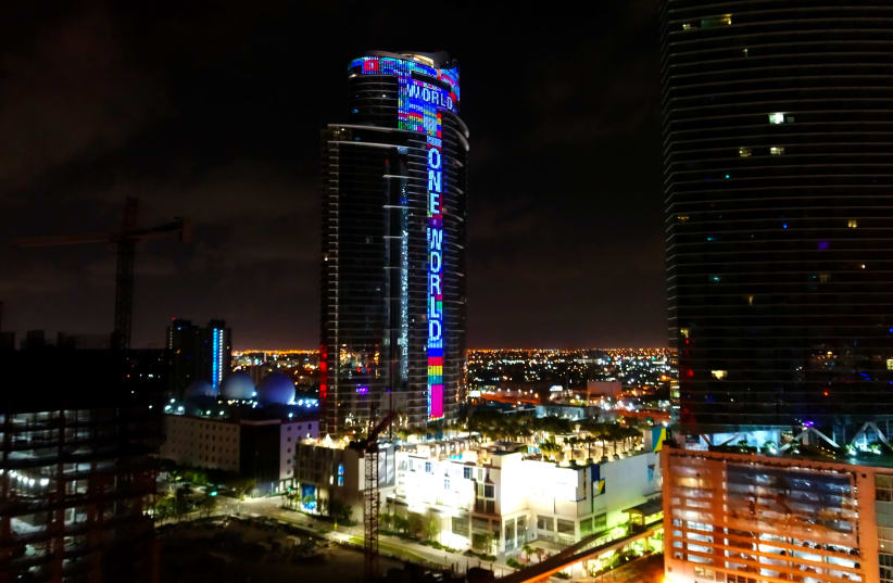PARAMOUNT MIAMI Worldcenter lights up to honor Surfside victims. (World Satellite Television News | Paramount Miami Worldcenter) (photo credit: WORLD SATELLITE TELEVISION NEWS)