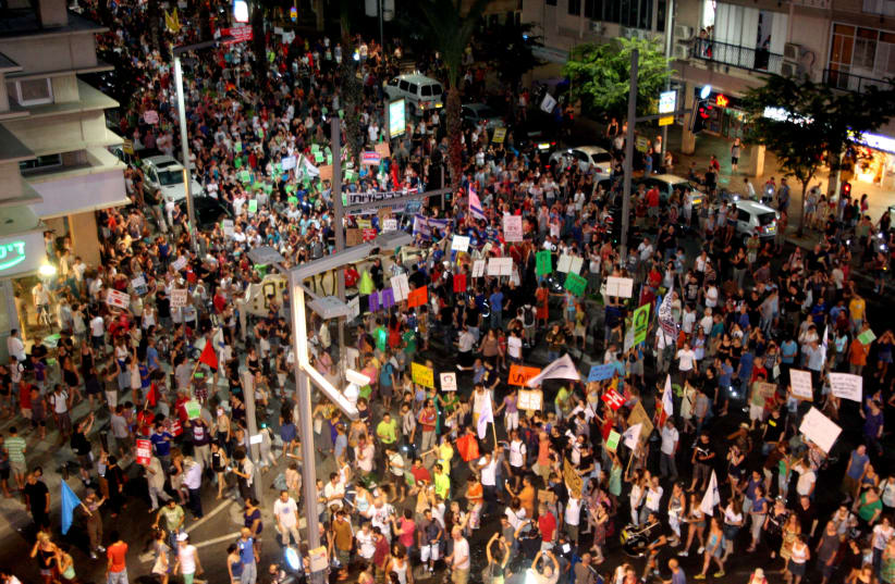 Thousands of Israelis take part in a protest march against soaring prices of living in Tel Aviv on July 14, 2012. (photo credit: RONI SCHUTZER/FLASH90)