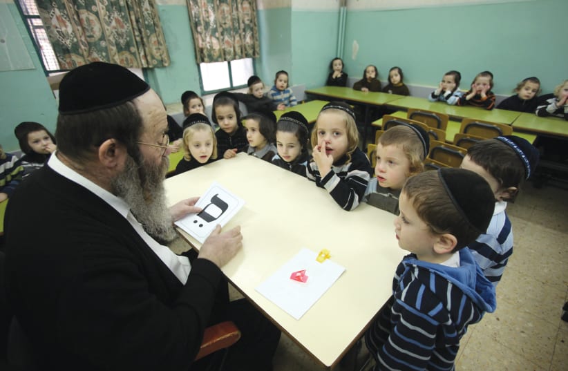 CHILDREN STUDY Hebrew letters at a school in Mea She’arim. (photo credit: YOSSI ZAMIR/FLASH90)