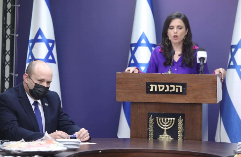 Interior Minister Ayelet Shaked and Prime Minister Naftali Bennett are seen at the Knesset, on July 5, 2021. (photo credit: MARC ISRAEL SELLEM/THE JERUSALEM POST)