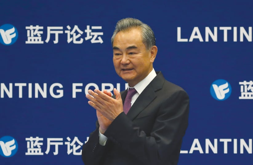 CHINESE FOREIGN MINISTER Wang Yi attends a Lanting Forum with the theme ‘China and the UN: Cooperation in 50 Years and Beyond,’ in Beijing last month. (photo credit: TINGSHU WANG/REUTERS)