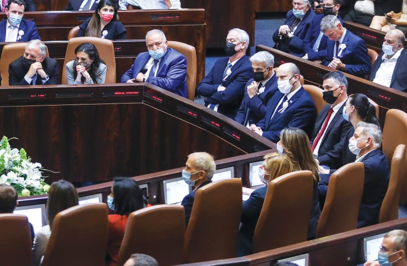 PRIME MINISTER Naftali Bennett and ministers in his coalition attend the swearing-in ceremony of President Isaac Herzog in the Knesset on Wednesday. (photo credit: MARC ISRAEL SELLEM/THE JERUSALEM POST)