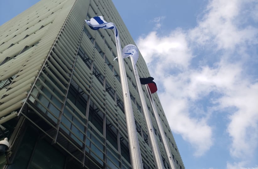 Flags of the UAE and Israel at the new Emirati Embassy in Tel Aviv, July 14, 2021.  (photo credit: BEN BARUCH)