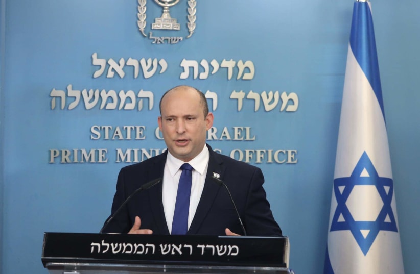 Prime Minister Naftali Bennett adresses the nation at a press conference regarding the coronavirus pandemic, July 14, 2021. (photo credit: MARC ISRAEL SELLEM)