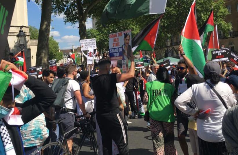 The ‘Netanyahu = Hitler’ sign at an anti-Israel demonstration in London  on June 12. (photo credit: LEE HARPIN/JEWISH NEWS)