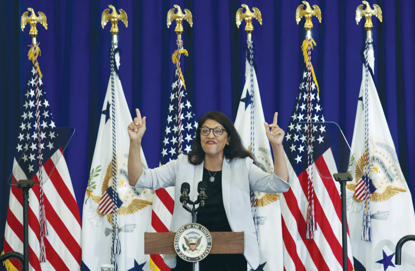 MICHIGAN DEMOCRATIC Congresswoman Rashida Tlaib, speaking in Detroit last week, and some of her ‘Squad’ colleagues are using their notoriety to bring antisemitic policies and rhetoric into the mainstream. (photo credit: REBECCA COOK / REUTERS)