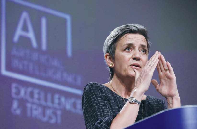 EUROPEAN EXECUTIVE Vice President Margrethe Vestager speaks at a media conference on the European Union’s approach to artificial intelligence, in Brussels, in April. (photo credit: OLIVIER HOSLET/REUTERS)