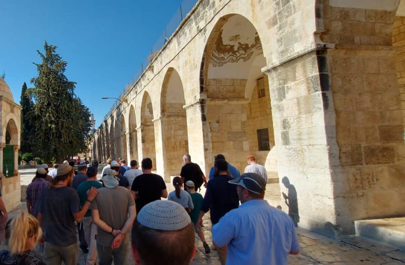 Jews ascend to the Temple Mount in Jerusalem during Tisha Be'av, July 18, 2021. (photo credit: HOZRIM LAHAR NGO)