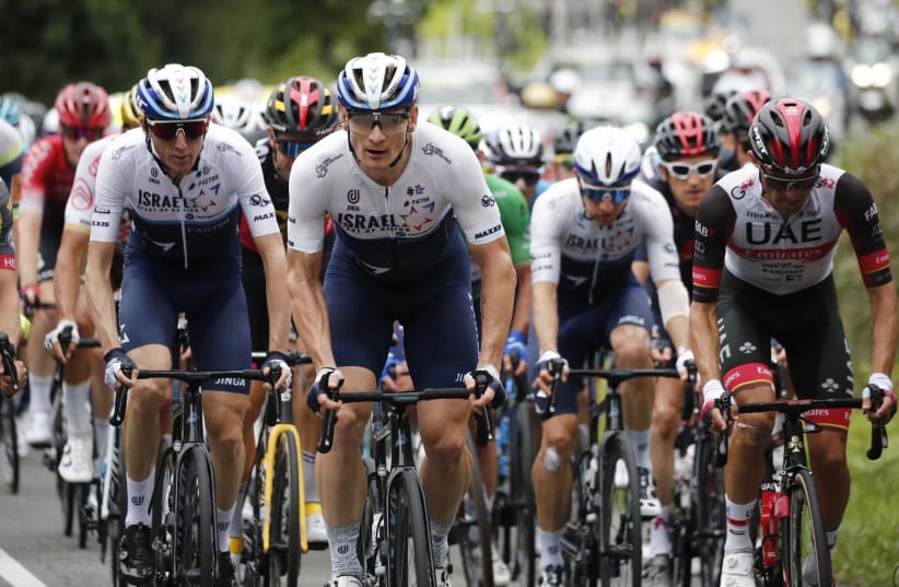 After many of its riders sustained injuries early on in the Tour de France, Israel Start-Up Nation rebounded nicely to have more than respectful showing in its second time in the competition. (photo credit: BENOIT TESSIER /REUTERS)