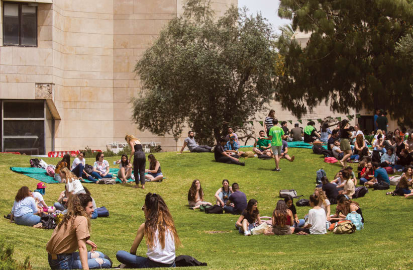 Students at the Mount Scopus campus of the Hebrew University of Jerusalem earlier this year.  (photo credit: OLIVIER FITOUSSI/FLASH90)