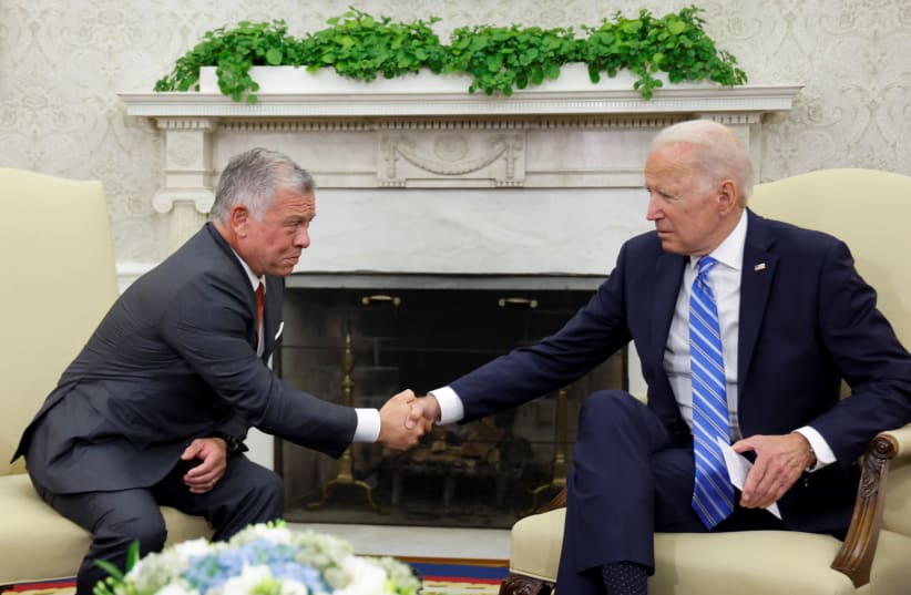 US President Joe Biden shakes hands with Jordan's King Abdullah II in the Oval Office at the White House in Washington, US, July 19, 2021. (photo credit: REUTERS/JONATHAN ERNST)