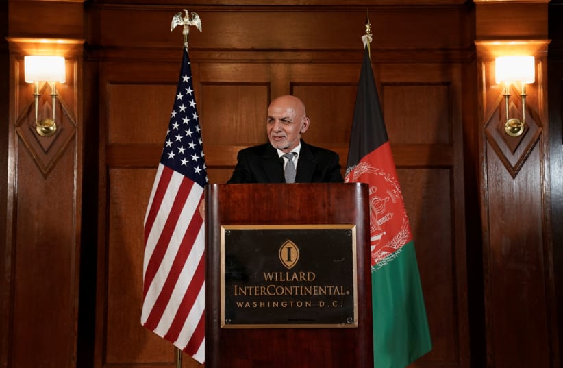 Afghanistan's President Ashraf Ghani speaks during a news conference following his meeting with U.S. President Joe Biden, at the Willard Hotel in Washington, DC, US, June 25, 2021.  (photo credit: REUTERS/KEN CEDENO)