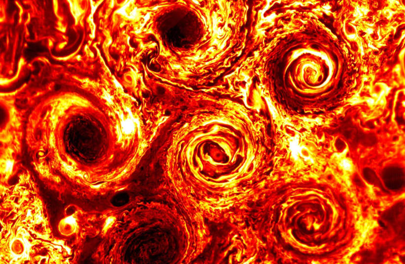 Six cyclones in Jupiter’s south pole as captured by Juno’s infrared lens in February 2017. Surprisingly organized and resembling a round tray of cinnamon rolls (photo credit: NASA)