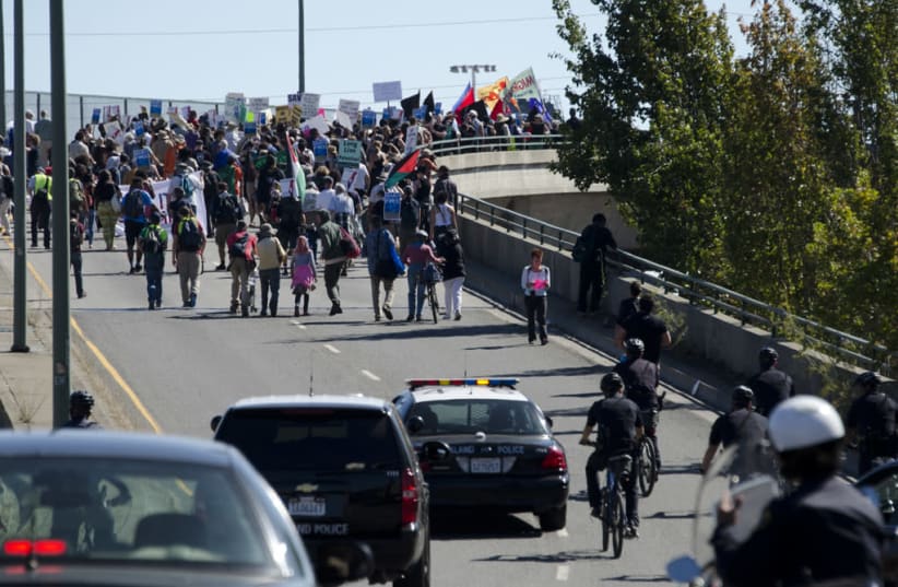 Around 2,500 BDS protesters are seen flocking to the Port of Oakland, California, to stop a cargo ship operated by the Israeli-based ZIM company from unloading in protest of Operation Protective Edge, on August 16. 2014. (photo credit: Wikimedia Commons)