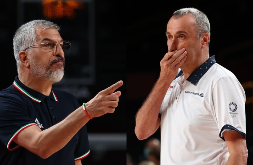 Iranian Olympic basketball team coach Mehran Shahintab (L) and Israeli born coach of the Czech Republic's basketball team Ronen Ginzburg are seen at the Iran-Czech Republic game at the 2020 Olympics in Tokyo, Japan, on July 25, 2021. (photo credit: BRIAN SNYDER/REUTERS)