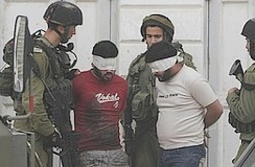Troops arrest Palestinians 248.88 (photo credit: )