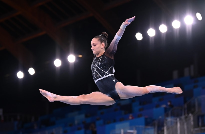  ISRAELI GYMNAST Lihie Raz outdid expectations on Sunday in the artistic gymnastic competition. While she didn't advance, she recorded impressive performances in the floor exercise, the balance beam and the uneven bars. (photo credit: REUTERS)