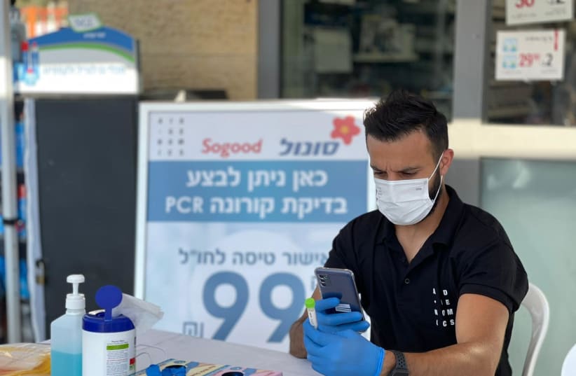 Coronavirus PCR tests being performed at Sonol gas stations. (photo credit: Courtesy)