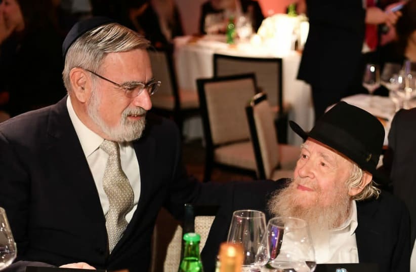 Rabbi Sacks with Rabbi Steinsaltz at a gala dinner on June 10, 2018, to celebrate the latter’s 80th birthday (photo credit: YISRAEL BARDOGO)